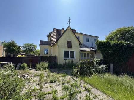 Ansicht vom Garten - Doppelhaushälfte in 29525 Uelzen mit 123m² kaufen