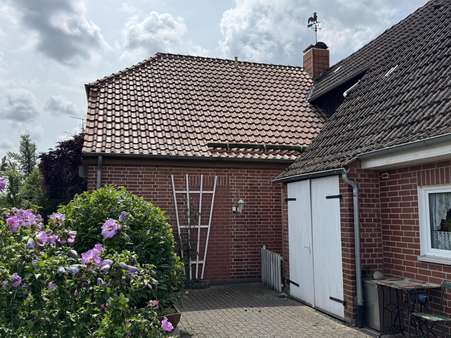 seitlicher Eingang und Abstellraum - Einfamilienhaus in 29588 Oetzen mit 182m² kaufen