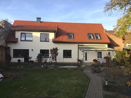 Ansicht vom Garten - Mehrfamilienhaus in 29439 Lüchow mit 275m² kaufen