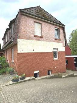 Seitenansicht - Mehrfamilienhaus in 29574 Ebstorf mit 173m² kaufen