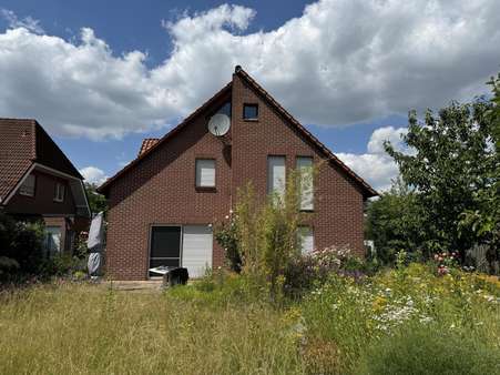 Ansicht vom Garten - Einfamilienhaus in 30559 Hannover mit 120m² kaufen