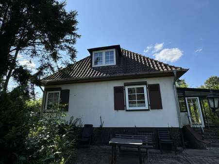 Seitenansicht mit Terrasse - Einfamilienhaus in 29389 Bad Bodenteich mit 90m² kaufen