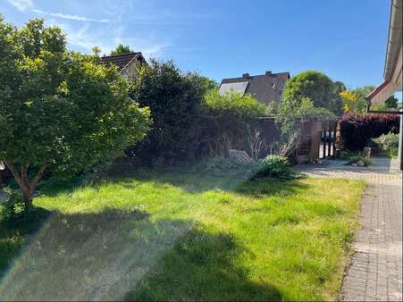 Blick in der Garten - Einfamilienhaus in 29643 Neuenkirchen mit 209m² kaufen