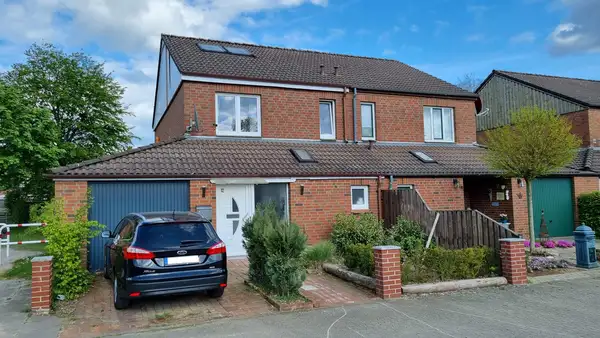 Vermietete Einfamilien-Doppelhaushälfte mit Garage