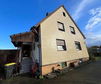 Giebelseite mit Eingang - Einfamilienhaus in 31174 Schellerten mit 112m² kaufen