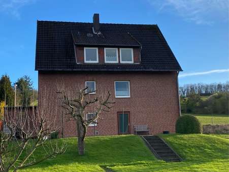 Gartenansicht - Zweifamilienhaus in 31061 Alfeld mit 160m² kaufen