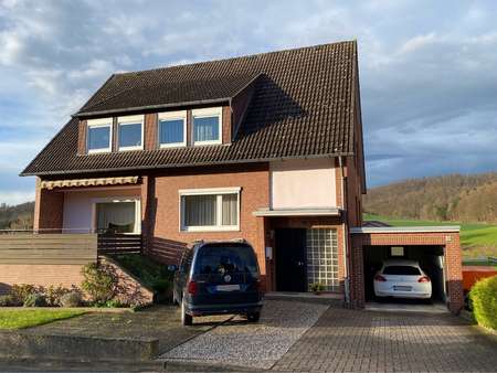 Vorderansicht/Garage - Zweifamilienhaus in 31061 Alfeld mit 160m² kaufen