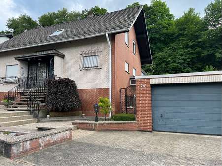Ansicht mit Garage 1 - Einfamilienhaus in 31061 Alfeld mit 147m² kaufen