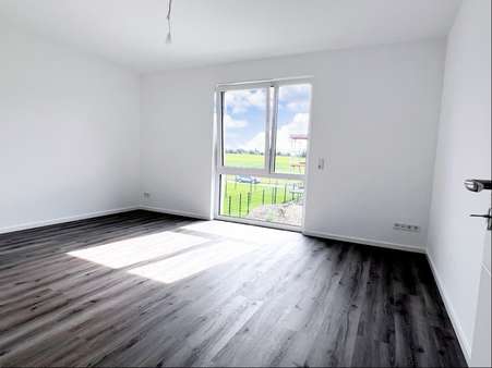 Schlafzimmer im 1. OG - Maisonette-Wohnung in 31157 Sarstedt mit 163m² kaufen
