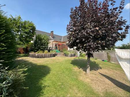 Gartenansicht Gartenansicht - Erdgeschosswohnung in 31246 Ilsede mit 107m² kaufen