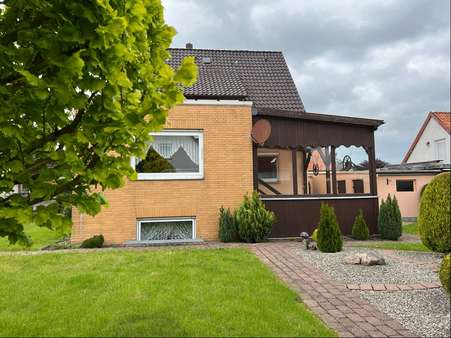 Gartenansicht - Einfamilienhaus in 31089 Duingen mit 116m² kaufen