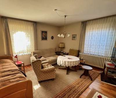Wohnzimmer im EG - Einfamilienhaus in 37434 Obernfeld mit 176m² kaufen