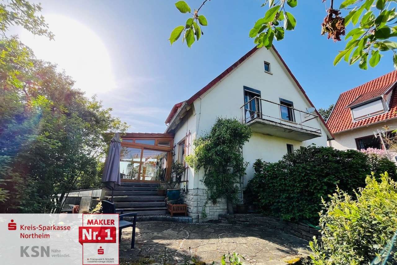 Rückansicht mit Wintergarten und Terrasse - Einfamilienhaus in 37154 Northeim mit 140m² kaufen