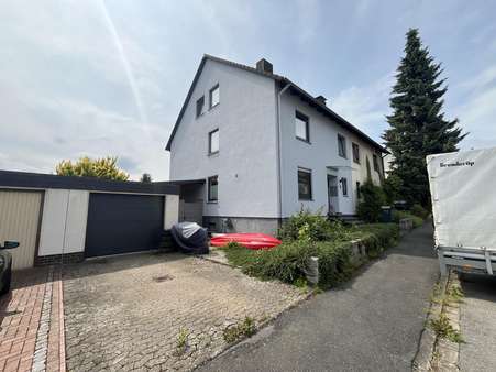 Straßenansicht - Doppelhaushälfte in 37581 Bad Gandersheim mit 153m² kaufen
