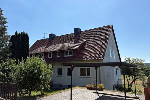 Vorder- und Seitenansicht Vorder- und Seitenansicht - Wohnung in 37186 Moringen mit 138m² kaufen