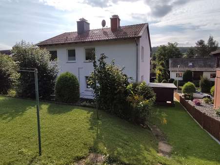 Rückansicht - Zweifamilienhaus in 37176 Nörten-Hardenberg mit 143m² kaufen