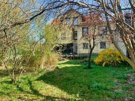 Rückseite mit Garten Rückseite mit Garten - Zweifamilienhaus in 37520 Osterode mit 260m² kaufen