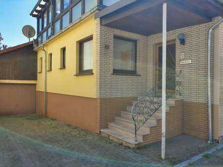 Hauseingang Hofzufahrt Hauseingang Hofzufahrt - Einfamilienhaus in 37431 Bad Lauterberg mit 140m² kaufen