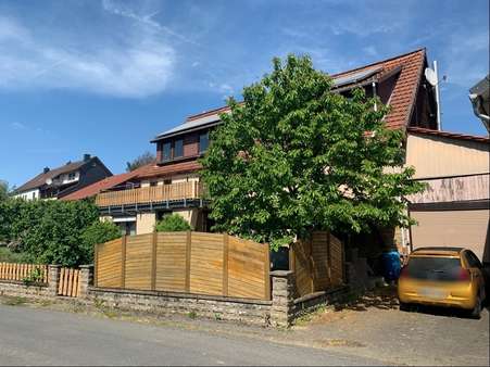 Straßenseite mit Garage - Zweifamilienhaus in 37520 Osterode mit 248m² kaufen
