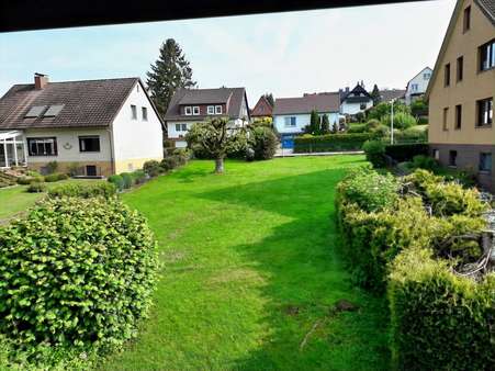 Blick in den Garten (extra Baugrundstück) - Einfamilienhaus in 37520 Osterode mit 163m² kaufen