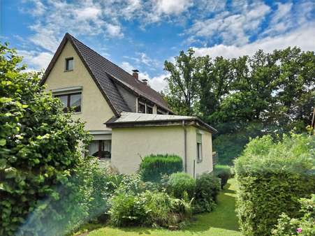 Seitenansicht - Einfamilienhaus in 37520 Osterode mit 163m² kaufen