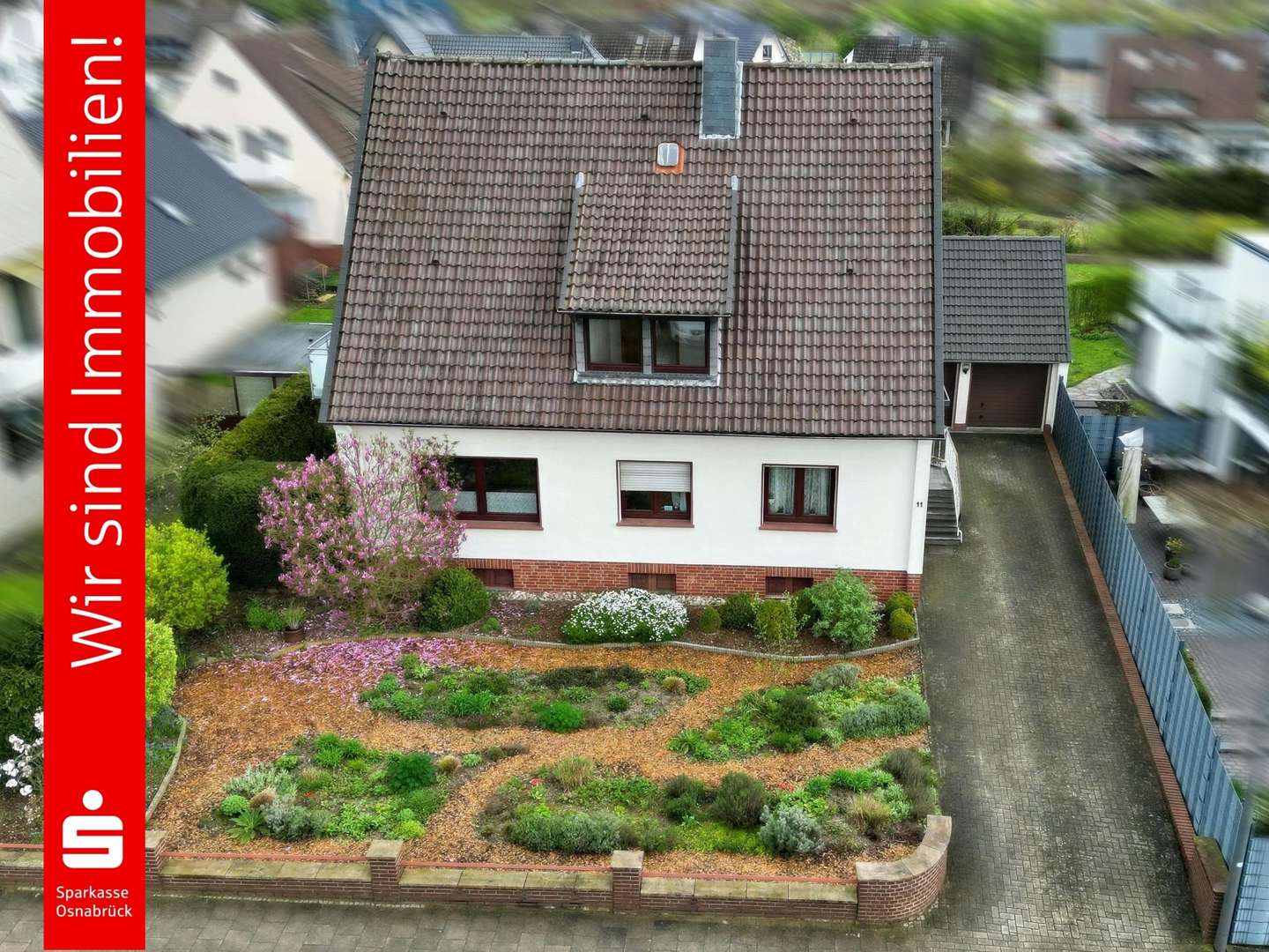 Drohne Straßenansicht - Zweifamilienhaus in 49076 Osnabrück mit 147m² kaufen
