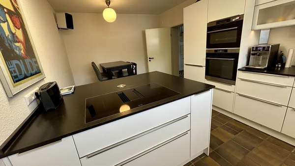 Küche mit Kochinsel im EG - Reihenendhaus in 49124 Georgsmarienhütte mit 116m² kaufen