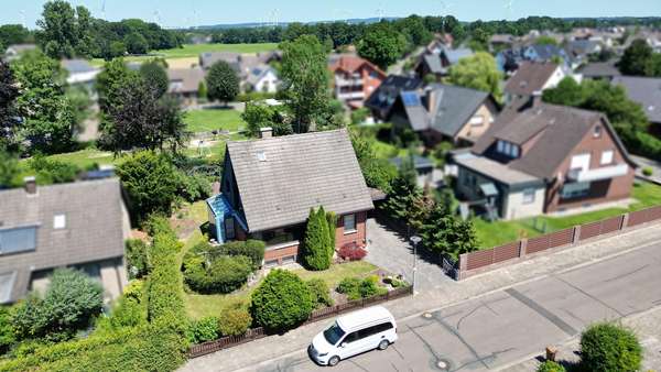 Frontansicht mit Umgebung - Einfamilienhaus in 49163 Bohmte mit 130m² kaufen