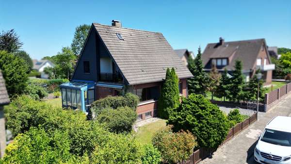 Seitenansicht - Einfamilienhaus in 49163 Bohmte mit 130m² kaufen