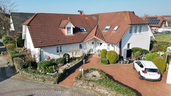 Frontansicht - Zweifamilienhaus in 49179 Ostercappeln mit 288m² kaufen