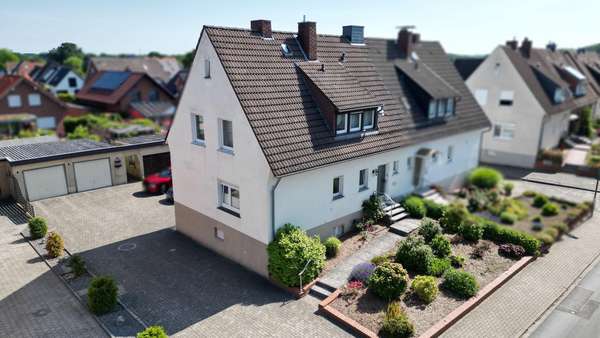 Straßenansicht Straßenansicht - Doppelhaushälfte in 49205 Hasbergen mit 101m² kaufen