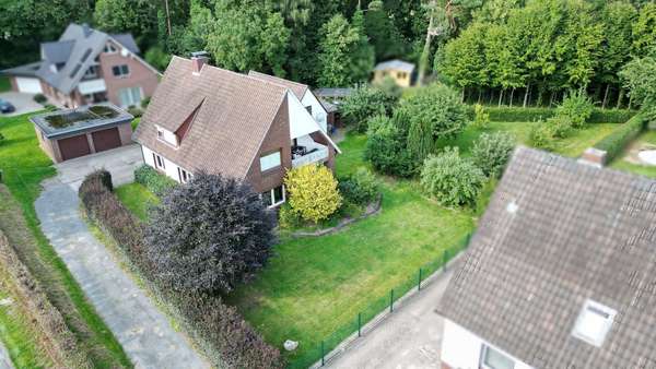 Seitenansicht - Einfamilienhaus in 49179 Ostercappeln mit 163m² kaufen