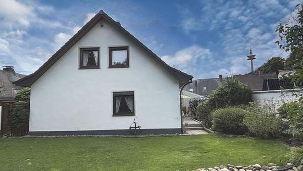 Rückansicht Rückansicht - Einfamilienhaus in 49086 Osnabrück mit 111m² kaufen