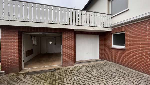 Die Garagen - Zweifamilienhaus in 49170 Hagen mit 150m² günstig kaufen