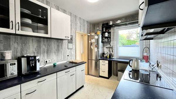 Die Küche im Erdgeschoss - Doppelhaushälfte in 49124 Georgsmarienhütte mit 145m² günstig kaufen