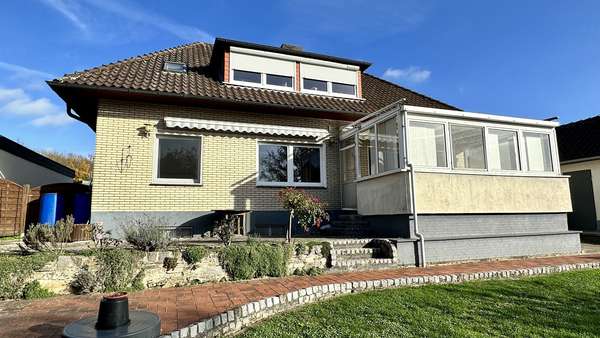Die Rückansicht des Hauses - Zweifamilienhaus in 49196 Bad Laer mit 157m² günstig kaufen