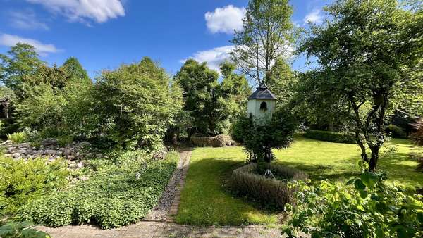 Teilausschnitt des Gartens Teilausschnitt des Gartens - Einfamilienhaus in 49170 Hagen mit 170m² kaufen