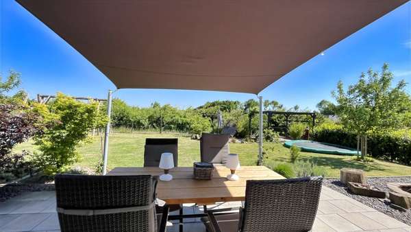 Blick von Terrasse in den Garten - Einfamilienhaus in 49201 Dissen mit 142m² kaufen