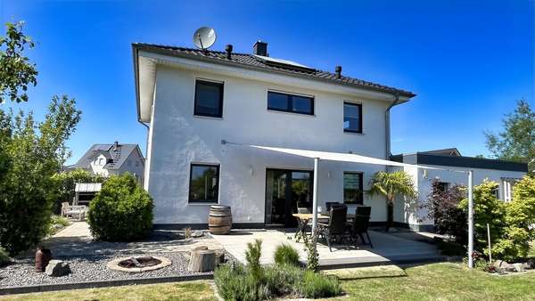 Rückansicht - Einfamilienhaus in 49201 Dissen mit 142m² kaufen