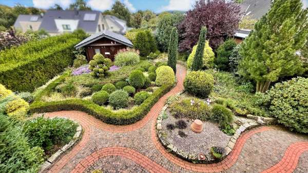 Der Blick in den Garten - Einfamilienhaus in 49170 Hagen mit 203m² kaufen