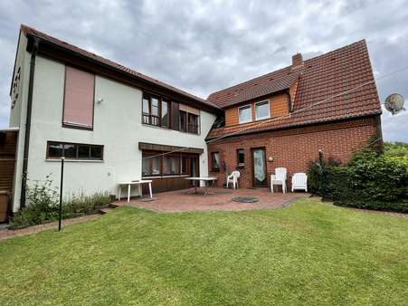 Westansicht Terrasse - Zweifamilienhaus in 49565 Bramsche mit 223m² günstig kaufen