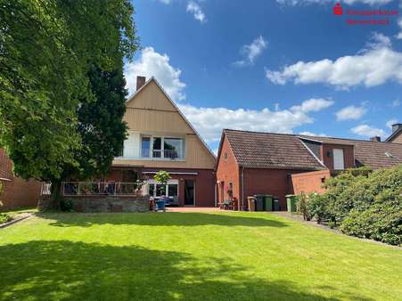 Rückwärtige Hausansicht - Mehrfamilienhaus in 49635 Badbergen mit 250m² günstig kaufen