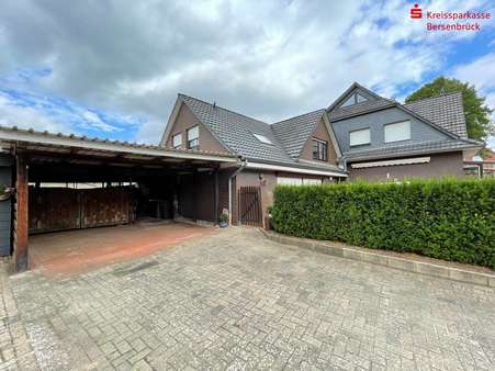 Auffahrt Carport - Zweifamilienhaus in 49584 Fürstenau mit 334m² günstig kaufen