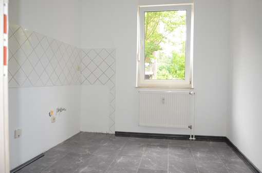 Küche - Erdgeschosswohnung in 49610 Quakenbrück mit 77m² günstig kaufen