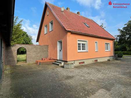 Nebeneingang, Zugang Garten - Einfamilienhaus in 49594 Alfhausen mit 137m² kaufen