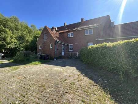 Rückansicht - Reihenmittelhaus in 49767 Twist mit 85m² kaufen