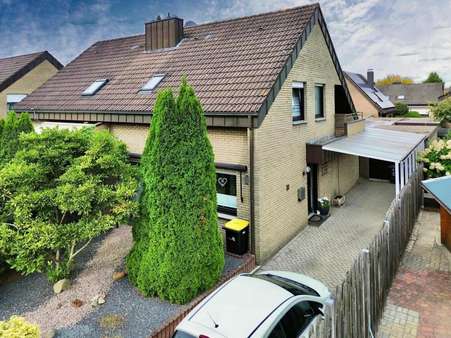 Vorderansicht Vorderansicht - Doppelhaushälfte in 48529 Nordhorn mit 109m² kaufen