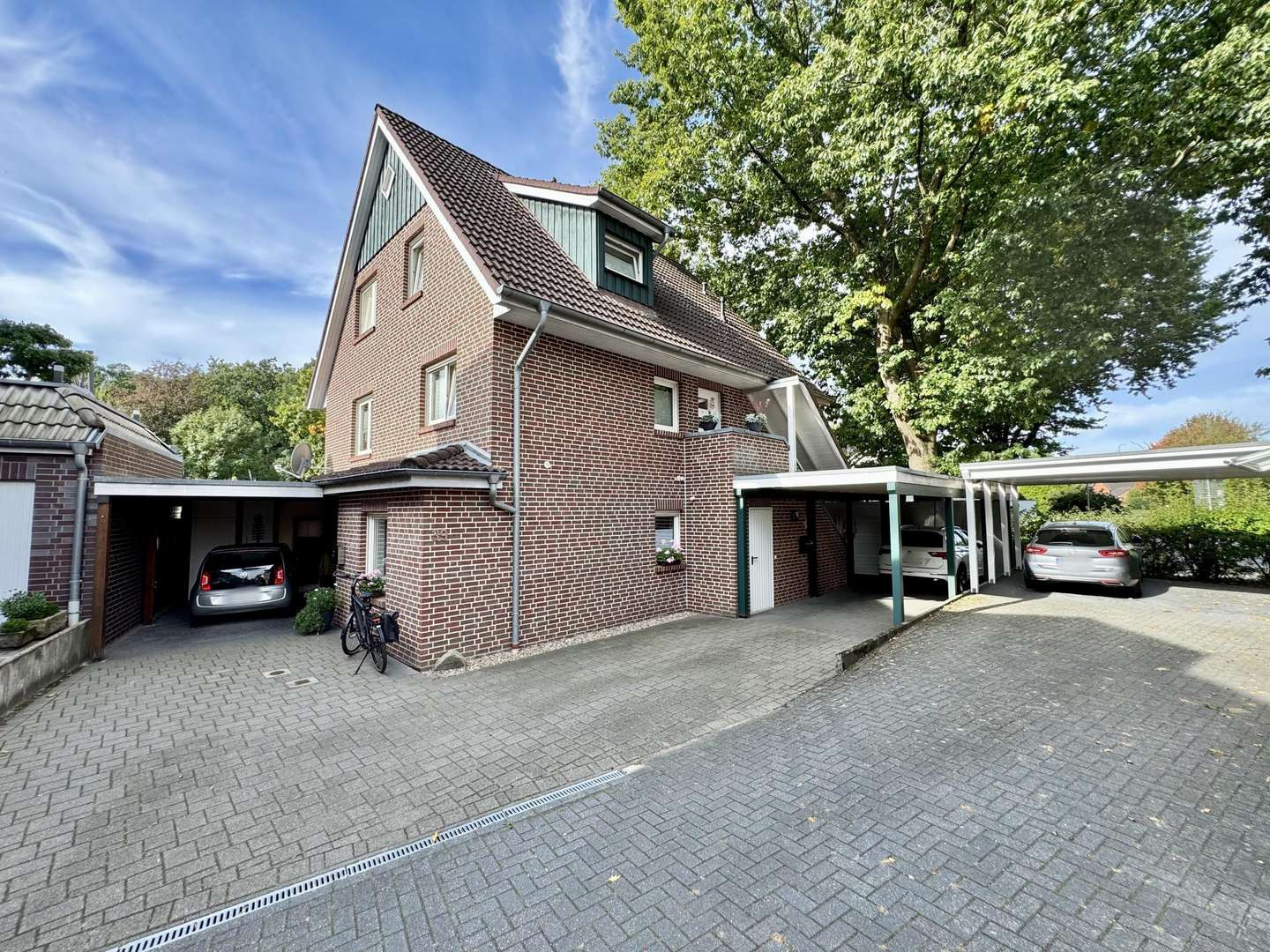 Vorderansicht seitlich Vorderansicht seitlich - Erdgeschosswohnung in 48527 Nordhorn mit 80m² kaufen
