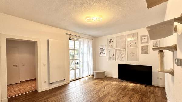 Wohnzimmer - Doppelhaushälfte in 48529 Nordhorn mit 100m² kaufen
