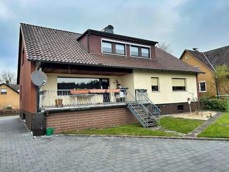 Außenansicht Hausrückseite - Zweifamilienhaus in 29313 Hambühren mit 214m² kaufen